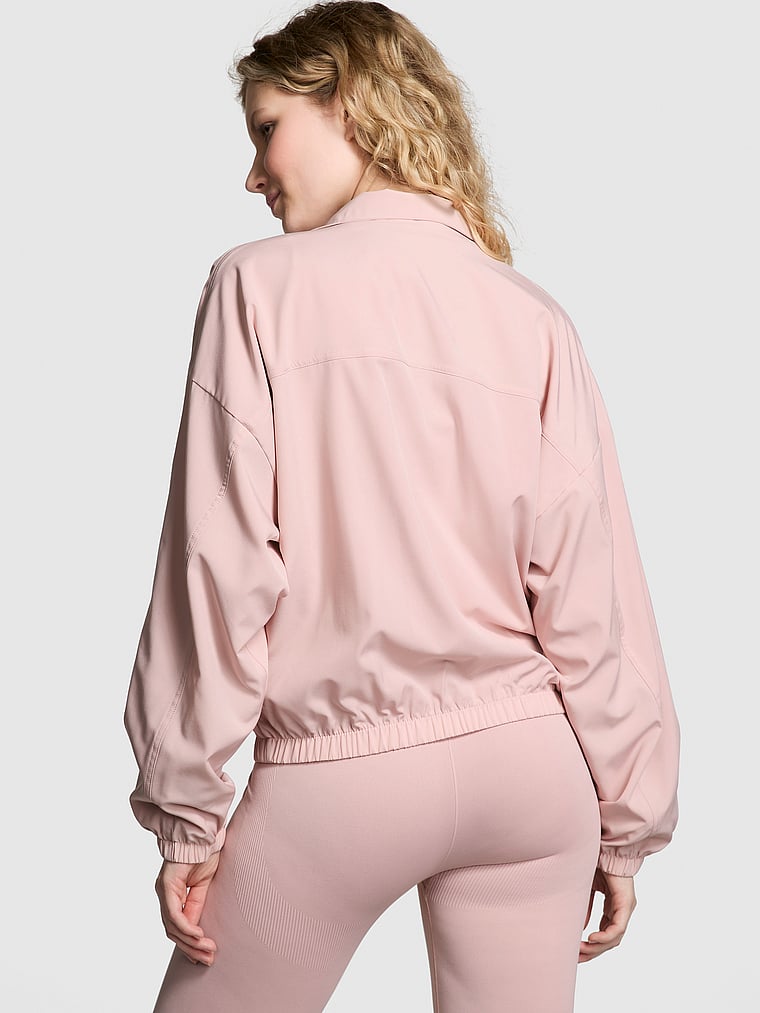 PINK Tech Stretch Full-Zip Jacket, Wanna Be Pink, onModelBack, 2 of 4 Anabel is 5'8" and wears Small