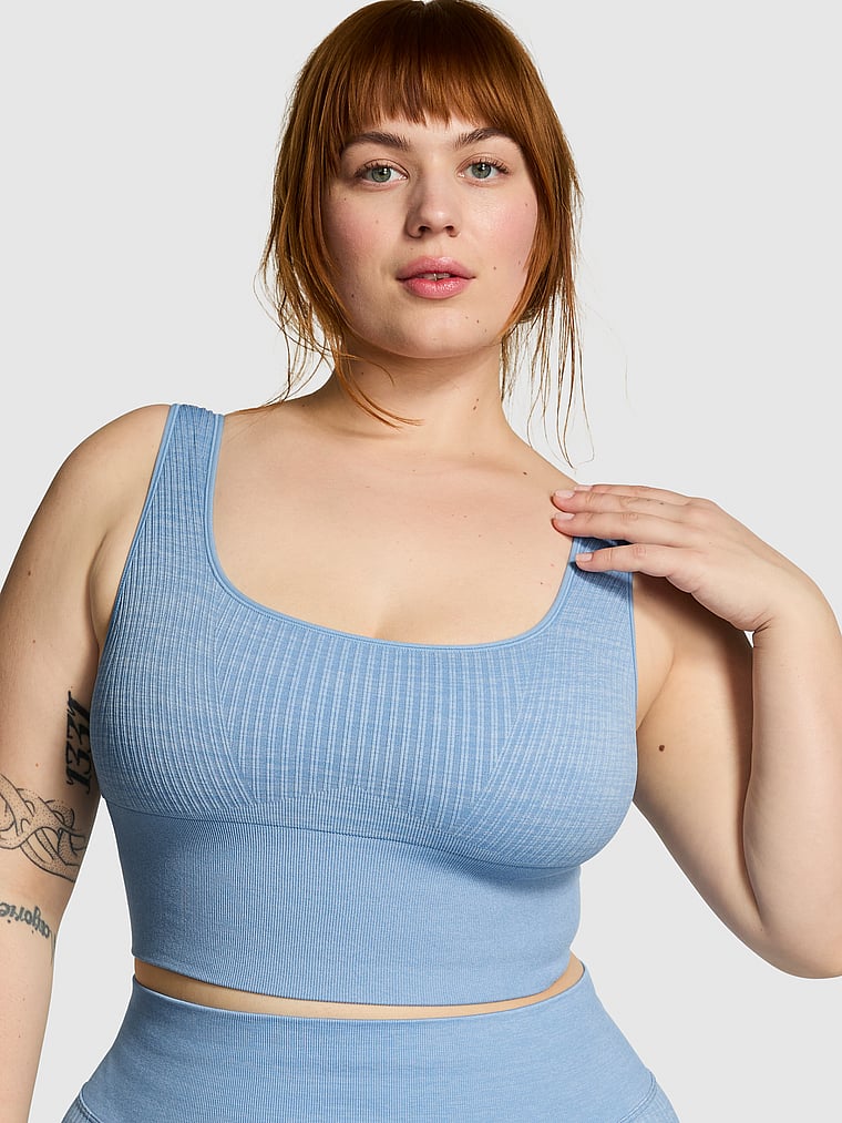 PINK Seamless Crop Sports Bra, Denim Blue, onModelFront, 3 of 4 Lulu is 5'7" and wears 38DDD (F) or Large