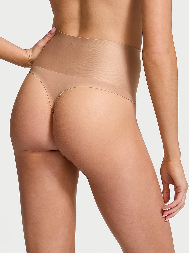 Victoria's Secret, Body by Victoria SmoothingShimmer™ Thong Panty, Praline, onModelBack, 2 of 3 Kennidy is 5'11" and wears Small