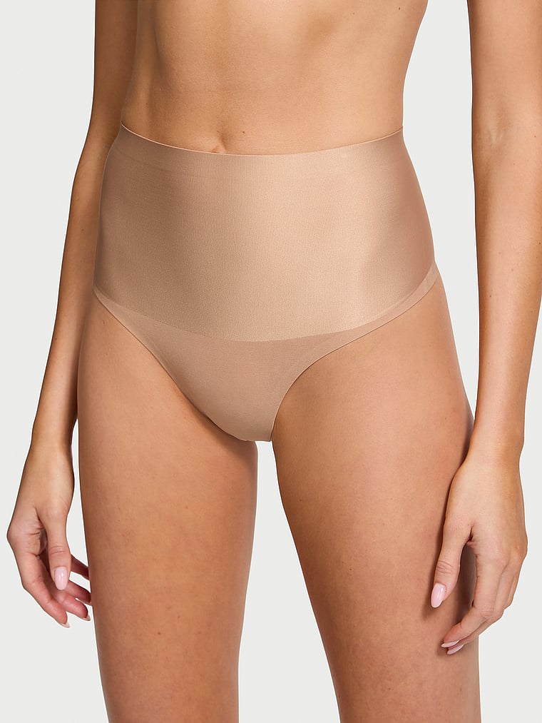 Victoria's Secret, Body by Victoria SmoothingShimmer™ Thong Panty, Praline, onModelFront, 1 of 3 Kennidy is 5'11" and wears Small