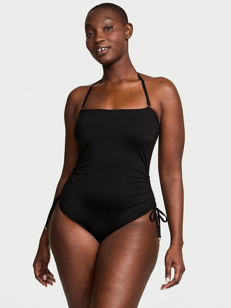 Victoria's Secret, Victoria's Secret Swim Essential Strapless Ruched One-Piece Swimsuit, Pure Black, onModelFront, 1 of 3 Arame is 5'11" and wears Medium