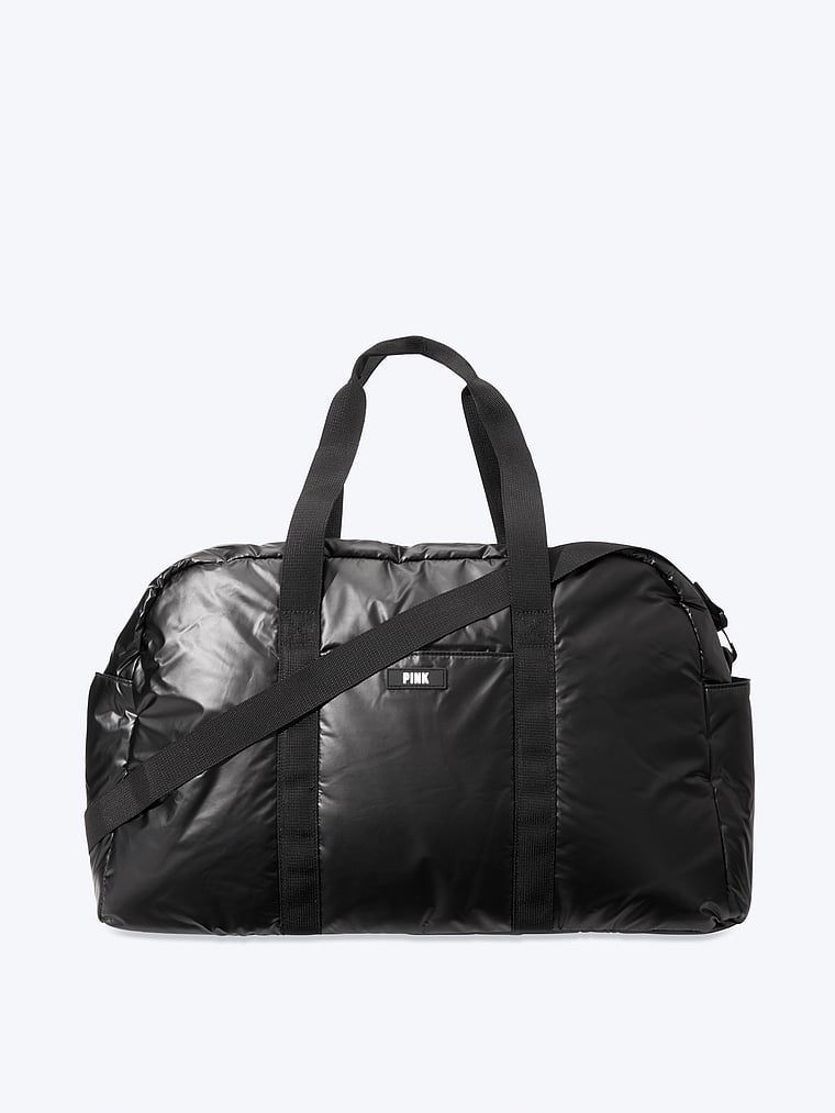 pink duffle bag black and white